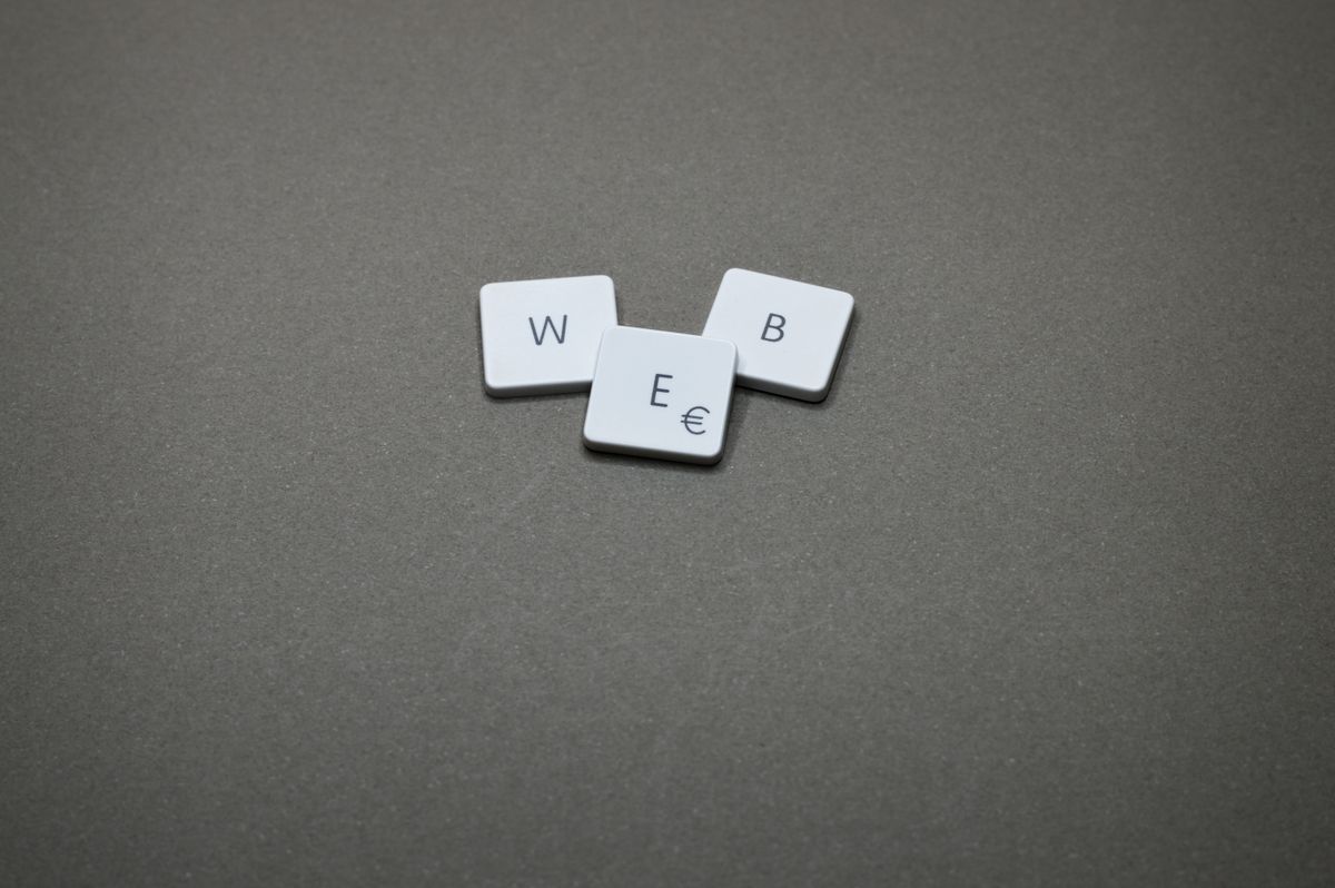 Letter tiles on a plain surface