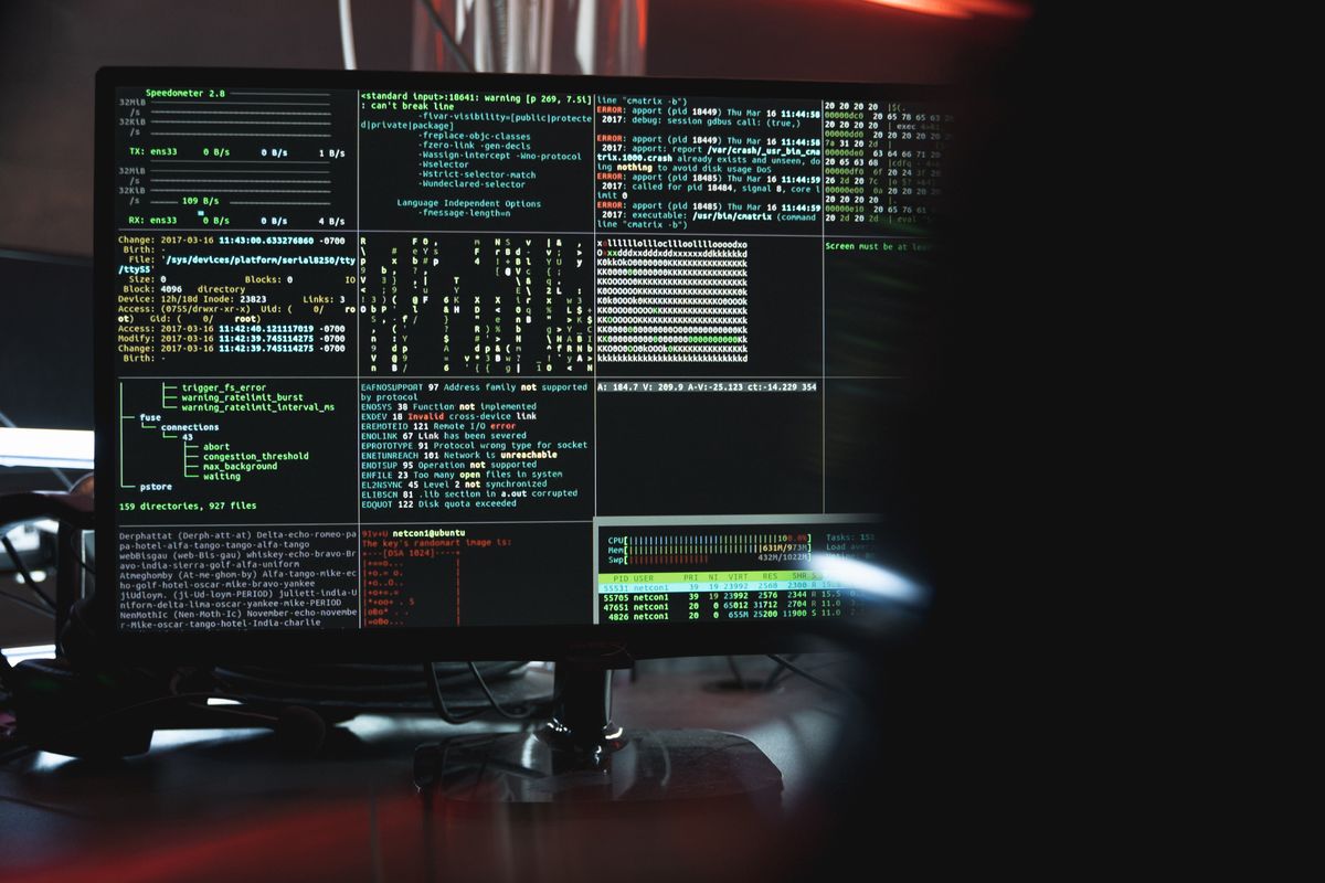 Code displayed on computer screens