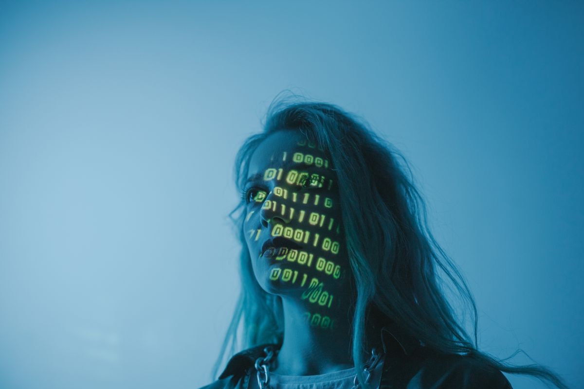 A portrait with projected code — conceptual stock photograph